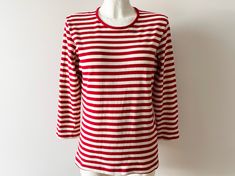 Vintage FINNWEAR cotton shirt, red Nautical top, striped Sailor blouse, marine long sleeve summer sweater, gift for her, size medium  Label Size: M Measurements (lying flat): Shoulders - 15.5 in Pit to pit - 18 in Sleeve - 19 in Length - 24 in Brand: FINNWEAR Please check measurements to insure a proper fit. Remember to allow yourself some extra room for movement. You can compare these with something from your closet that fits you well. Please convo me if you need additional measurements. This t Classic Striped Crew Neck Shirt, Nautical Cotton Tops For Fall, Spring Nautical Cotton Tops, Nautical Long Sleeve Tops For Summer, Nautical Style Long Sleeve Summer Tops, Striped Sailor Style Cotton Top, Blue Nautical Style T-shirt For Summer, Striped Sailor Long Sleeve Top, Sail Colored Short Sleeve Nautical T-shirt