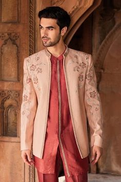 Dusty pink jacket with cutdana, zardozi, dabka embroidery in floral pattern. Paired with kurta and pant. - Aza Fashions Designer Pink Kurta With Resham Embroidery, Traditional Long Sleeve Pink Bandhgala, Traditional Pink Long Sleeve Bandhgala, Formal Pink Bandhgala With Intricate Embroidery, Pink Resham Embroidered Bandhgala For Formal Occasions, Pink Nehru Jacket With Resham Embroidery, Formal Pink Bandhgala With Resham Embroidery, Elegant Pink Long Sleeve Nehru Jacket, Formal Pink Nehru Jacket With Zari Work