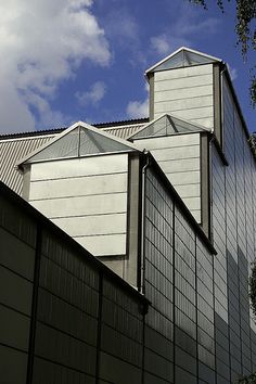 the side of a building with a clock on it