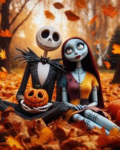 two skeletons are sitting in the leaves with pumpkins and jack - o'- lanterns