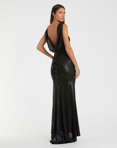 Crafted from sleek jersey fabric, this gown features a high neckline, cowl open back, and a cascading ruffle detail. Ieena for Mac Duggal Metallic jersey fabric (100% polyester) Fully lined Boat neckline Sleeveless Cowl open back Cascading ruffle detail featured on back of skirt Concealed side zipper Approx. 60" from top of shoulder to bottom hem Available in Black Style #49087 Destination Wedding Guest Dress, Fall Formal Dresses, Fall Wedding Guest Dress, Black Tie Gala, Evening Dresses Cocktail, Column Gown, Daytime Dresses, Full Length Dress, Fall Wedding Dresses