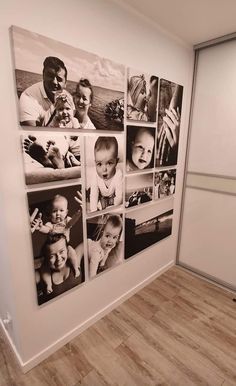 a wall with multiple pictures on it in an empty room next to a white door