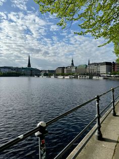 there is a view of the water and buildings on the other side of the river