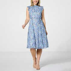 Nina Leonard Printed Smock Neck Midi Dress   Get the perfect figure-flattering shape every time when wearing this cute and classy smocked-neck midi dress from Nina Leonard. Blue Knee-length Dress With Smocked Back, Blue Midi Dress With Gathered Neckline, Elegant Blue Smocked Dress, Blue Dress For Garden Party With Gathered Neckline, Spring Knee-length Midi Dress With Elastic Neckline, Spring Midi Dress With Smocked Back For Work, Chic Smocked Midi Dress For Garden Party, Chic Smock Midi Dress For Garden Party, Blue Smocked Dress With Gathered Neckline For Summer