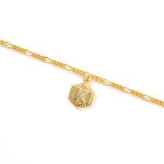 Make a sophisticated personal style statement and add a dash of luster to any ensemble with this sublime anklet. Beautifully crafted in sterling silver, it will help you represent your initial with elegant flair. Give personalized jewelry gift - represent your initials in style with this small tag on a beautifully crafted figaro chain.Weight: 4.548 gWidth: 9.9 mmHeight: 13.4 mmThickness: 1.8 mmMaterial: 925 SilverStone Type: Jeulia® StonePlating Color: Yellow GoldLength: 270 mm Gold Sterling Silver Anklet As Gift, Personalized Adjustable Elegant Anklet, Elegant Personalized Adjustable Anklet, Personalized Gold Elegant Anklets, Elegant Silver Chain Bracelet With Initials, Elegant Initials Chain Bracelet, Elegant Personalized Gold Anklets, Elegant Gold Personalized Anklets, Silver Anklet