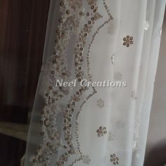 Beautiful embroidered dupatta with scallop border. Perfect for your wedding veil. It is very rich and classy dupatta. More dupatta here in our collection https://www.etsy.com/shop/neelcreations/?section_id=15880219 This Bridal Dupatta is embroidered on net with beautiful Scallop border. This can be your wedding dress chunni for Indian occasion wear for festival. This has perfect bling for you to look classy and ethnic at same time. NOTE : There might be slight color variation due to different co Traditional Nida Dupatta With Intricate Embroidery, Gold Dupatta With Chikankari Embroidery For Reception, Nida Dupatta For Reception And Diwali, Embroidered Nida Dupatta For Reception, Intricate Embroidery Nida Dupatta For Reception, Reception Nida Dupatta With Zari Work, White Chanderi Dupatta For Reception, Elegant Dupatta With Intricate Embroidery In Nida, Reception Embroidered Nida Dupatta