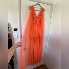 Stunning Angelika Orange Tulle Evening Gown. Cape-Like Shoulder Tulle In Front And Back. Moves Beautifully. Perfect Wedding Guest Dress!! Brand New Never Worn. 42 Eu/ 10us : Chest 98cm | Waist 82 Cm Orange Formal Dress Long, Orange Formal Dress, Orange Formal Dresses, Tulle Evening Gown, Gown Cape, Perfect Wedding Guest Dress, Orange Gown, Dresses Orange, Maxi Gown Dress