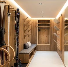 a room with some skis and snowboards in it