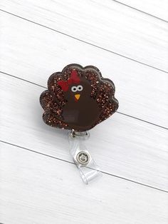 This adorable turkey badge reel can be personalized with your name or credentials or left blank.  You can making it interchangeable to change it to fit each holiday or mood. It is the perfect addition to add a bit of sparkle to your badge reel.  This also makes a great gift for healthcare workers, education staff and anyone else that has to wear a badge.DETAILS:-This badge reel measures approximately 2 inches.-Topper can be attached permanently or interchangeable using Dual Lock Velcro.  This en Custom Badges, Healthcare Workers, Book Markers, Badge Holder, Badge Holders, Your Name