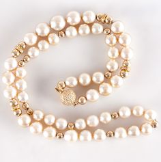 18k Yellow Gold Cultured Round Pearl Diamond Gold Bead Necklace .40ctw 57.9gMetal Information: 18k Yellow GoldTotal Weight: 57.9gNecklace Width: 11.6mmNecklace Length: 22"Stone InformationMain StoneGem Type: PearlShape: Round (11.6mm - 8.1mm)Color: CreamClarity/Quality: AANumber of Stones: 47Accent StoneGem Type: DiamondShape: Single Round (1.0mm)Color: IClarity/Quality: I1Carat Weight: .005ctNumber of Stones: 80Total estimated ctw (carat total weight): .40ctwEstimated Retail Price: $3910.00OUR Luxury Beaded Necklaces, Elegant Yellow Gold Necklaces With Polished Beads, Luxury Formal Beaded Necklaces With Polished Beads, Luxury Polished Beads Necklace For Formal Occasions, Luxury Polished Beaded Necklaces For Formal Occasions, Yellow Gold Necklaces With Polished Beads For Weddings, Wedding Yellow Gold Necklaces With Polished Beads, Beaded Yellow Gold Jewelry For Anniversary, Classic Gold Beaded Necklaces