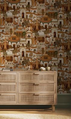 a wooden dresser sitting in front of a wall covered with pictures on it's side