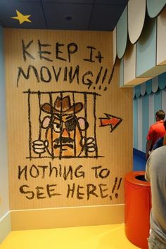 a sign that says keep it moving nothing to see here is written on the wall