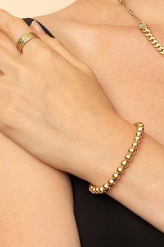 Have a ball while adding a touch of shine and sophistication to any outfit with our gorgeous ball chain bracelet. The perfect base to any ensemble, stack it or wear it solo for a look that is both cool and refined. 14k Solid Yellow Gold 7.5 Inches Length 6mm Ball Diameter, Teardrop Lobster Clasp 8.7 Grams Gold Crafted in Istanbul, Turkey Gold Ball Chain Bracelet, Elegant Gold Ball Chain Bracelet, Elegant Yellow Gold Ball Chain Bracelet, Tarnish-resistant Yellow Gold Plated Bracelet, Yellow Gold Fine Jewelry Bracelets, Tarnish Resistant, Ball Chain Bracelet, Ball Bracelet, Istanbul Turkey, Ball Chain