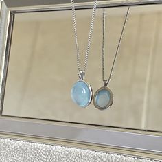 Immerse yourself in the serene beauty of the sea with our Aquamarine 925 Sterling Silver Pendant Necklace, an exquisite piece of aquamarine jewelry. Our Aquamarine S925 Silver Pendant Necklace, an ideal necklaces for women who appreciate the unique beauty of nature, is meticulously crafted from pure S925 silver. This dainty necklace features a pendant that showcases an enchanting oval-cut natural aquamarine, illuminating in varying shades of sea blue, reflecting the light it captures. Each aquam Blue Pendant Necklace, Necklace Birthstone, Gemstone Pendant Necklace, Aquamarine Necklace, Charm Necklace Silver, Aquamarine Jewelry, Necklace Minimalist, Aquamarine Gemstone, Gemstone Necklace Pendant