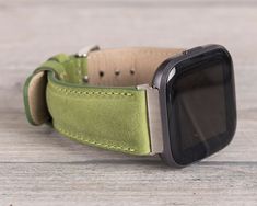 "Full Grain leather green band for Fitbit Versa 1-2-3-Lite-Sense This watch strap is medium size and fits 6\"-7.6\" (150-190mm) wrists. Four different color options for adapters (Silver, Black, Rose Gold, Gold). Adapter color and buckle color will be same. Shipping takes usually 3-4 business days (via USPS First Class-Free), 2 business days (via FedEx 2Day) and 1 business day (via FedEx Overnight). To Europe: 1-2 business days via TNT Express. Customization: We can write messages, names, dates a Green Leather Watch Bands For Everyday Use, Adjustable Green Apple Watch Band For Everyday Use, Adjustable Green Apple Watch Band, Modern Green Watch Accessories For Everyday Use, Green Leather Modern Watch Accessories, Modern Green Leather Watch Accessories, Green Adjustable Bracelet Strap Watch Accessories, Adjustable Green Bracelet Strap Watch Accessories, Green Leather Watch Bands With Bracelet Strap