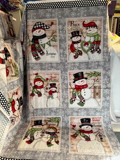 a quilted blanket with snowmen on it