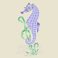 a blue and green sea horse sitting on top of grass