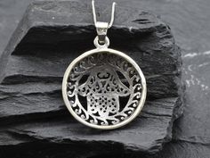 Hamsa Hand Pendant made of Solid 925 Sterling Silver ☞ made to last.Matching Ring & Earrings - please ask meDetails:• Large Round Necklace• Dimensions: Pendant Height 35mm, Width 25mm• Free Complimentary Chain• Solid 925 Sterling SilverSKU TE-031 Sterling Silver Pierced Round Pendant Jewelry, Round Jewelry With Oxidized Finish For Gifting, Round Jewelry With Oxidized Finish For Gift, Round Oxidized Jewelry Gift, Spiritual Sterling Silver Filigree Jewelry, Silver Filigree Symbolic Jewelry, Silver Statement Necklace, Mandala Necklace, Hand Pendant