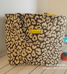 Open styled tote with inside pockets and a zippered pocket. Leopard Print Tote Bag With Adjustable Strap, Leopard Print Tote Bag With Zipper Closure, Tote Handbag, Sister Love, Tote Handbags, Inside Pocket, Handbags, Ships, Etsy Uk