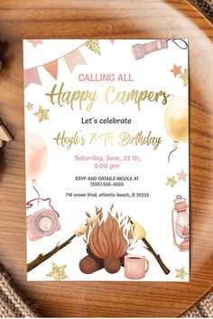 a birthday party with a campfire and camping items