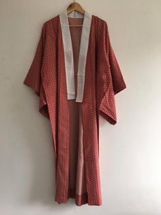 Vintage Japanese kimono, long kimono, Japanese kimono dress, kimono robe, night gown,silk gown,  hobo, long coat, hemp red, light mint green/0110light red based dress with light mint green hemp printed. This kimono called Nagajyuban is meant to be under-shirt of Kimono, yet it can be wore as night gown, robe etc.. Material:synthetic textilesCARE : hand wash recommendedSize: approx.length 133cm ( 52.36  inches)width 64cm ( 25.19 inches) length  49cm ( 19.29 inches)width  31cm ( 12.20 inches)Condi Samurai Style Kimono For Tea Ceremony, Traditional Red Kimono For Summer, Traditional Red Summer Kimono, Traditional Long Kimono For Spring, Traditional Long Kimono For Summer, Traditional Long Orange Kimono, Traditional Red Kimono For Tea Ceremony, Bohemian Kimono With Kimono Sleeves For Tea Ceremony, Traditional Red Kimono For Beach