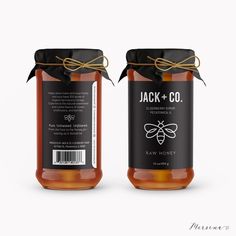 two jars of jack and co honey with labels on the front, one is filled with honey