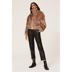 Tan faux shearling (100% Polyester). Shearling jacket. Long sleeves. Front button and zipper closure. 20" from shoulder to hemline. Imported. Faux Fur Trim Shearling Coat For Fall, Shearling Fur Coat With Faux Fur Trim For Fall, Fall Shearling Outerwear With Button Closure, Shearling Outerwear With Faux Fur Lining For Fall, Chic Shearling Outerwear For Fall, Fall Fur Coat With Button Closure, Fall Sherpa Fur Coat With Faux Fur Lining, Faux Shearling Jacket, Rent The Runway