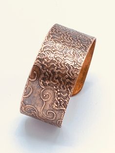 Vintage Copper Cuff Bracelet With Texture Bronze Wearable Art Cuff Bracelet As Gift, Bronze Bangle Bracelet In Wearable Art Style, Adjustable Bronze Cuff Jewelry, Bronze Cuff Bracelet As Gift, Bronze Cuff Bracelet For Gift, Handmade Adjustable Wide Band Bracelet, Bohemian Wide Band Adjustable Bracelets, Bohemian Wide Band Adjustable Bracelet, Metal Wide Band Cuff Bracelet Gift