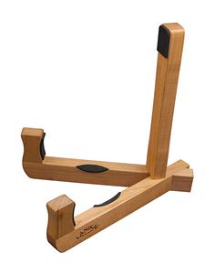 a wooden stand with two black handles on it