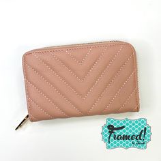 Introducing the Nola Chevron Quilted Zip Wallet - the perfect accessory for any on-the-go girl! Keep your cash and cards organized in style with this trendy and functional wallet. Button closure flap, includes ID slot, 5 card slots, money slip pocket Zip around section includes interior zip pocket and 2 divided slots 5.75" x 1.3" x 3.8" Trendy Rfid Blocking Wallets For Daily Use, Trendy Rfid Blocking Coin Purse For Daily Use, Trendy Wallet With Card Slots For Everyday Use, Trendy Wallets With Card Slots, Trendy Travel Bifold Wallet, Trendy Travel Card Holder, Trendy Bifold Travel Wallet, Trendy Bifold Wallet With Interior Card Slots, Trendy Rfid Blocking Bifold Wallet