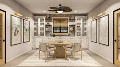 a large dining room with white walls and ceiling fan