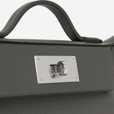 The 24/24 bag from Hermes is a great choice for a luxury everyday bag, featuring a soft base and rigid flaps its the perfect amount of structure. This one is crafted from Gris Misty Evercolor leather and palladium hardware. The name "24/24" was introduced for this bag as it was created to be used 24 hours of the day, carrying you through the daytime to the evening. SPL Exterior Gris Misty/Noir Evercolor and Swift Leather Palladium hardware Front flap Twist lock closure Top handle Rear slip pocket W stamp- 2024 production Brand new Interior Gris Pale swift leather Single compartment One zip pocket Brand new Sold with box, dust bag, strap, redacted receipt SPL Height 16cm Width 21cm Depth 12cm Dior Shoes, Everyday Bag, Chanel Handbags, Top Handle, Zip Pockets, Swift, Dust Bag, Dior, Louis Vuitton