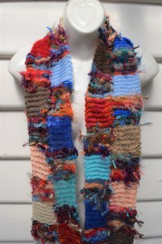 Scarf is knitted in patchwork style Rainbow colors Highly textured Is 13cm wide by 180cm long Care is handwash in luke warm water, squeeze gently and dry flat Seller does not ship to Europe Handmade Multicolor Scarves One Size, Artsy Multicolor Handmade Scarves, Patchwork Scarf Knit, Multicolor Knit Fabrication Winter Scarves, Multicolor Knitted Acrylic Scarf, Patchwork Scarf, Art Scarves, Hand Knit Scarf, Diy Couture