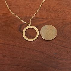 Just Got This And It Is In Perfect Condition. The Only Reason I’m Selling Is Because It Is Too Similar To Another That I Already Own. Solid 14k Gold Circle Pendant And Chain. Pendant Is Approx .75” In Diameter. Chain Has Options To Be Worn 18” Or 16” Long. Very Lightweight And Easy To Wear - You Won’t Even Know You Have It On! The Open Circle Is For The New Moon And A Time Of New Beginnings. Wear With Love! Sterling Silver Open Circle Jewelry In Yellow Gold, 14k Gold Circular Jewelry, Gold Sterling Silver Jewelry Open Circle, Tarnish Resistant Yellow Gold Circular Jewelry, Fine Jewelry In Gold With Open Circle Design, Fine Jewelry Gold Open Circle, Gold Open Circle Fine Jewelry, 14k Yellow Gold Circular Jewelry, Fine Gold Jewelry In Open Circle Shape