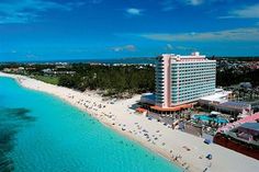 an aerial view of the beach and hotel