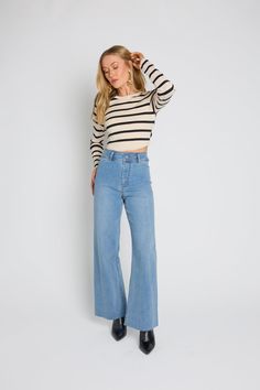 Our best-selling Devan denim jeans are back and in new colors! This high waisted, wide leg denim features a raw hemline and relaxed fit. These jeans pair well with bodysuits, crop tops, sweaters, you name it! Comes in mint, cream, olive (faded, deep green), dark green (vibrant dark green), black, chocolate brown, charc Stretch Cropped Jeans In Light Wash For Fall, Fall Cropped Denim Blue Bottoms, Fall Cropped Denim Bottoms, Cropped Denim Blue Bottoms For Fall, High Waist Medium Wash Flare Jeans With Frayed Hem, Fall Cropped Dark Wash Jeans, High Waist Light Wash Flare Jeans For Fall, High-waist Light Wash Jeans For Fall, Fall High-waist Medium Wash Flare Jeans