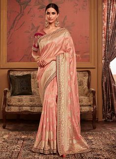 Peach Dola Silk Wedding Wear Embroidery Work Saree MAHARANI 184 Desc: Description Peach Pure Soft Dola silk saree with zari woven and fancy lace border work .The blouse comes as unstitched with embroidery work. Browse our stunning collection of festive wear and wedding silk sarees at KollybollyethnicS and enjoy complimentary worldwide shipping. Theres no need for a minimum order or coupon code. Elevate your festive spirit with our exquisite silk sarees this season. This Diwali weve introd... Peach Saree, Indian Designer Sarees, Green Embroidery, Latest Designer Sarees, Designer Sarees Online, Party Kleidung, Embroidery Saree, Trendy Sarees, Work Sarees