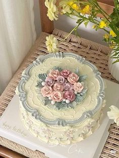 there is a cake that has flowers on it