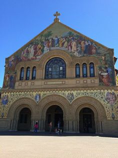 an ornate building with many paintings on it