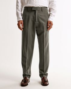 Our BDG classic suit pants in our suiting fabric. Tailored loose fit through the leg with a slight taper, featuring a shorter inseam designed to hit at the ankle and give a cleaner visual. For a standard visual, choose a longer inseam. Tailored Suit, Men's Bottoms, Suiting Fabric, Suit Pant, Classic Suit, Suit Pants, Tailored Suits, Suits Coats, Athletic Fits