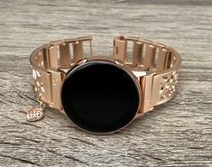 Rose Gold Bracelet for Samsung Galaxy Watches Compatible with: Galaxy Watch (42mm) | Galaxy Watch Active | Watch Active2 (40mm) | Watch Active2 (44mm) Super Light Bracelet - Weighs Around 1.2 oz 18mm Wide. Adjustable Size Bangle Fits 5.5 to 8 Inches (need to add or remove extra links) Comfortable Bangle with Secure Clasp. Includes Extra Links and Tool to Resize Wristband To Preferred Fitment. Create Your Own Unique Style! Be Different! Be Unique! Make a Fashion Statement Every Place You Go! Get Rose Gold Stainless Steel Watch Bands For Gift, Rose Gold Stainless Steel Watch Band As Gift, Rose Gold Watch Bands As Gift, Rose Gold Round Watch With Bracelet Strap, Rose Gold Round Bracelet Strap Watch Accessories, Rose Gold Bracelet Strap Watch Accessories, Round Rose Gold Watch Accessories As Gift, Rose Gold Stainless Steel Watch With Bracelet Strap, Rose Gold Round Stainless Steel Watch Accessories