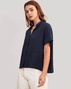 A favorite, refreshed. The Boxy Fit Short Sleeve Shirt has a classic collar, a clean button front, oversized grown-on sleeves, and a relaxed boxy fit. Dress it up with trousers and heels, or down with your favorite jeans for a casual-yet-polished look. 18 Momme Crepe De Chine Silk, Lightweight and Wrinkle-Resistant Shirt Collar Regular Fit Daywear Blouse With Camp Collar, Classic Tops With Rolled Sleeves And Camp Collar, Everyday Versatile Collared Shirt, Versatile Everyday Collared Shirt, Relaxed Collared Shirt For Daywear, Collared Tops For Everyday, Versatile Collared Top With Button Cuffs, Solid Collared Tops For Everyday, Modern Short Sleeve Tops With Button Cuffs