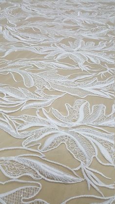 Elegant Embroidered Lace Fabric, Elegant Crochet Lace For Ceremonies, Fitted Embroidered Lace Fabric With Lace Work, Fitted Embroidered Lace Fabric For Ceremony, Elegant Wedding Lace Fabric And Notions, Elegant Wedding Fabric With Lace Work, Fitted Lace Embroidered Fabric For Ceremony, White Lace Dress For Ceremony, White Crochet Lace For Ceremonies