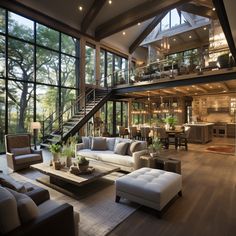 a living room filled with lots of furniture next to tall glass windows on top of a wooden floor