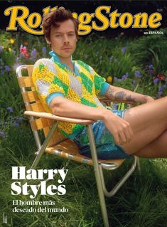 the cover of rolling stone magazine featuring harry styles sitting in a chair with his legs crossed