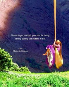 a woman hanging from a rope with a quote on it