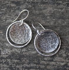 "🌟PLEASE READ the following description before making your purchase.  Note measurements and size reference photos. Rustic hammered large disc and circle sterling silver dangle earrings Hammered 24mm sterling silver circles and 20mm sterling silver discs dangle weightlessly from sterling budded hooks.  Virtually weightless! 1 ½\" total length" Hammered Silver Full Circle Jewelry, Silver Hammered Round Earrings, Silver Hammered Circle Earrings, Silver Hammered Open Circle Earrings, Hammered Sterling Silver Round Disc Earrings, Alloy Earrings, Hammered Sterling Silver, Sterling Silver Dangle Earrings, Metal Earrings