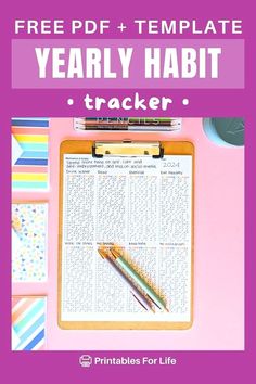 a clipboard with text that reads free df template yearly habit trackerr