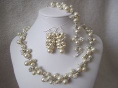 This unique set of bridal jewelry is perfect if you want something different and wow your guests because it's not something that you see everyday and can find everywhere. They are made with swarovski pearls, swarovski crystals, and swarovski rhinestones. You can choose from white or cream perals, different color crystals to match with your wedding color, and silver or gold rhinestones. If no color is specified, cream pearls with clear crystals and silver rhinestones will be shipped. They come in Wedding Necklace Pearl, Small Diamond Necklace, Small Gold Necklace, Swarovski Pearl Necklace, Necklace Set Indian, Pearl Bridal Jewelry, Necklace Swarovski, Pearl Jewelry Necklace, Purple Necklace