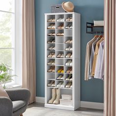 a white shoe rack with several pairs of shoes